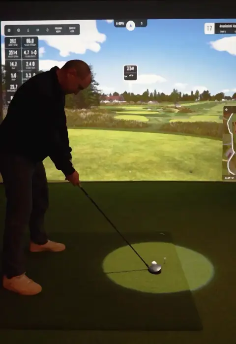 A golfer lining up a shot at Virtual Fairways, Darlington